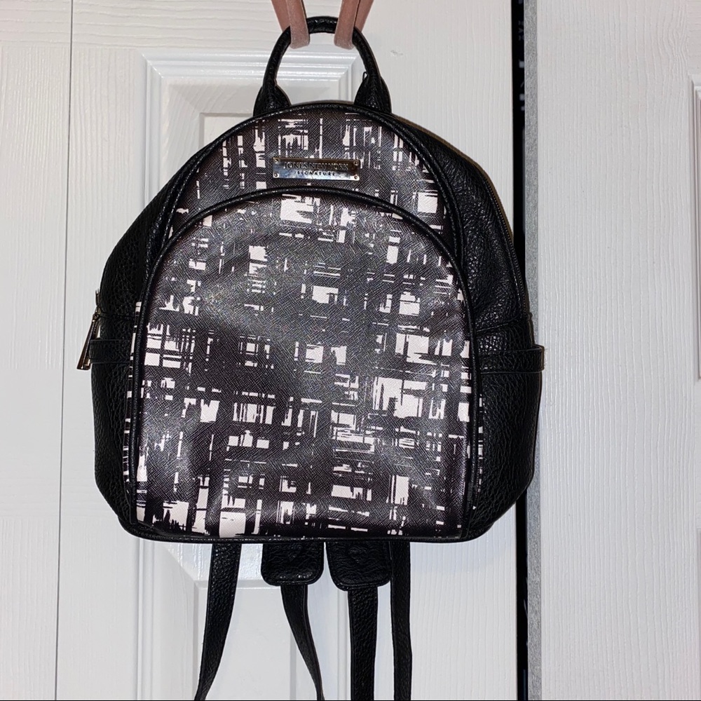 Back and white mini book bag